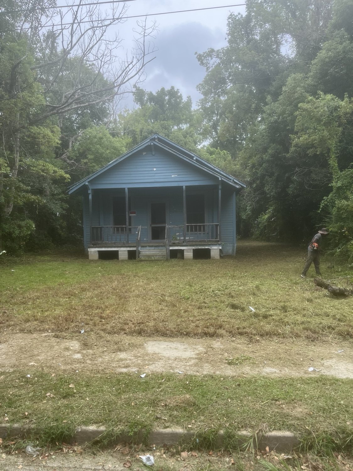 Same abandoned property — cleared by Williams Outdoor crew